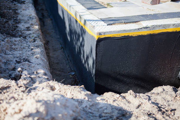 Professional Waterproofing technician working in Windsor Mill, MD